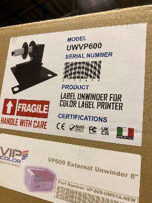 Unwinder with baseplate for colour or thermal printer 